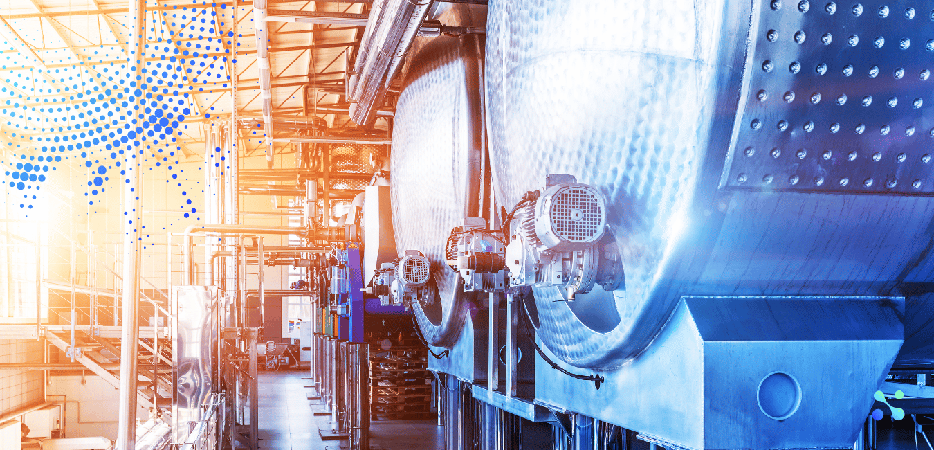 Industrial facility with modern machinery, symbolizing innovation, fintech, and blockchain as powerful drivers of new investment opportunities.