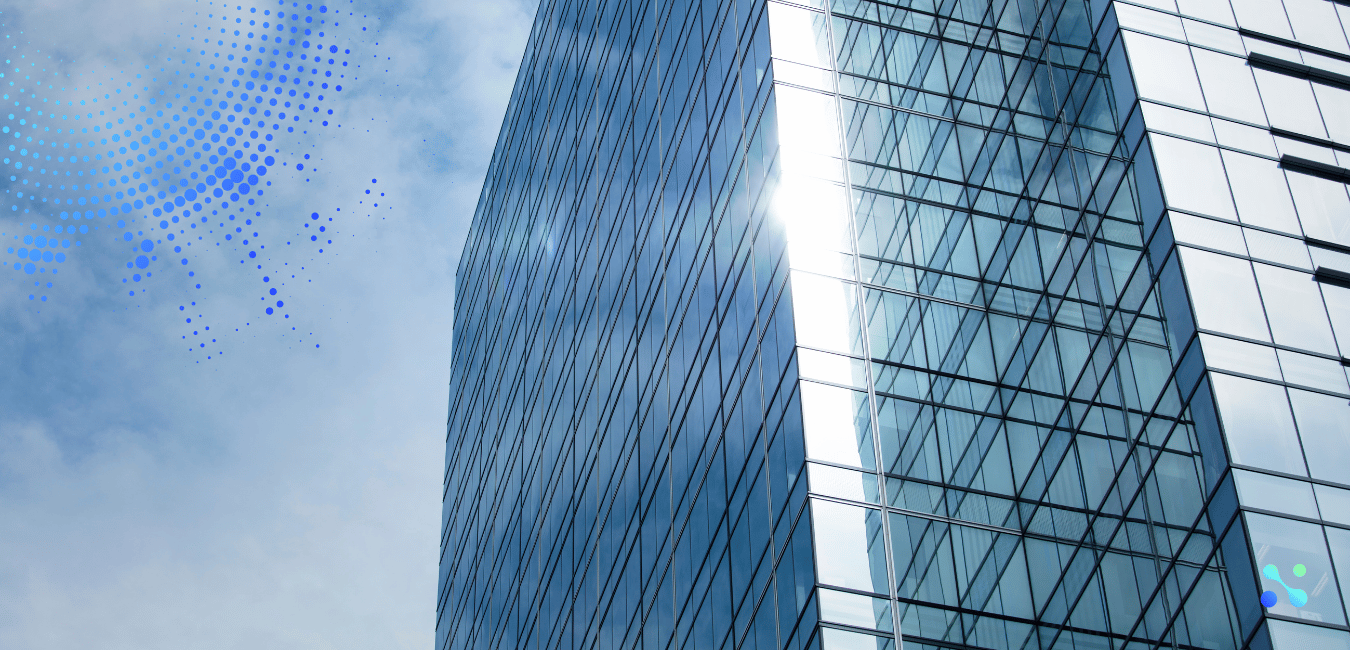 Modern glass skyscraper reflecting sunlight, symbolizing the transformative impact of finance and technology integration.